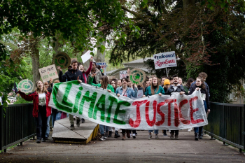 People Holding Banner People Holding Banner