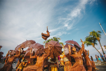 People in Brown Traditional Wear Under Blue Sky People in Brown Traditional Wear Under Blue Sky