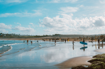 People on Beach Under Cloudy Sky People on Beach Under Cloudy Sky