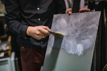 People painting on canvas People painting on canvas