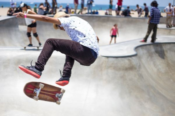 people playing skateboard on skateboard park people playing skateboard on skateboard park