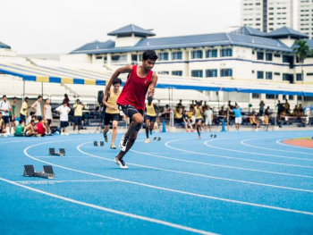 people playing track and field people playing track and field