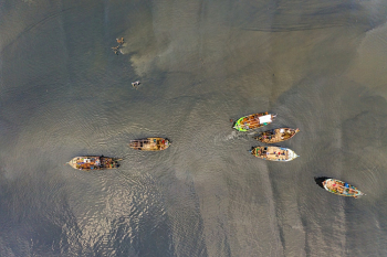 People Riding Boats People Riding Boats