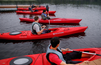 People Riding Kayaks People Riding Kayaks