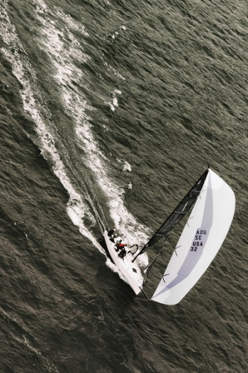 People Riding on White Sailboat on Body of Water People Riding on White Sailboat on Body of Water