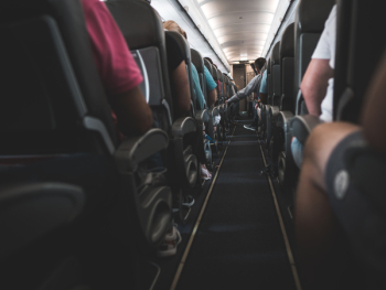 People Sitting on Plane Chairs People Sitting on Plane Chairs