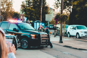 People Standing Beside Black Pickup Truck People Standing Beside Black Pickup Truck