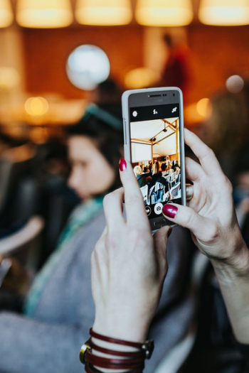People taking photos with smartphones People taking photos with smartphones