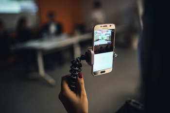 People taking photos with smartphones People taking photos with smartphones