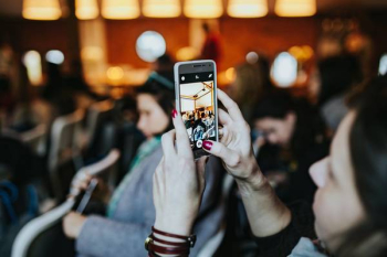 People taking photos with smartphones People taking photos with smartphones