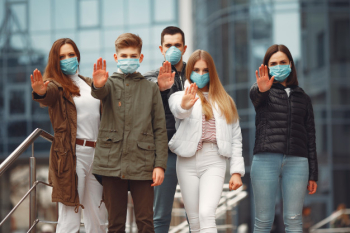 People wearing protective masks are showing stop sign by hands Free Photo People wearing protective masks are showing stop sign by hands Free Photo