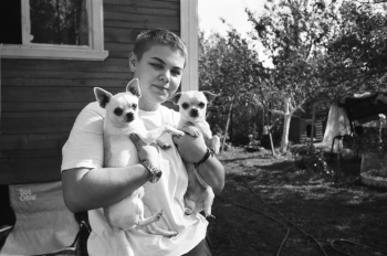 Person Carrying Two Chihuahua Person Carrying Two Chihuahua