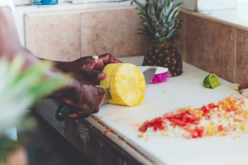 Person Chopping Fruit Person Chopping Fruit
