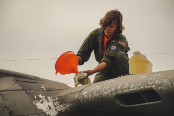 Person Cleaning Aircraft Person Cleaning Aircraft