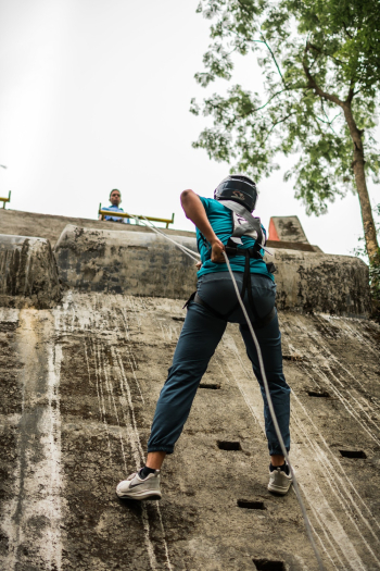 Person Climbing A Wall Person Climbing A Wall