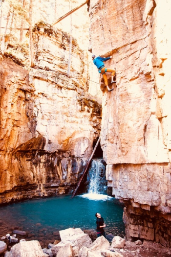 Person Climbing on Rock Person Climbing on Rock