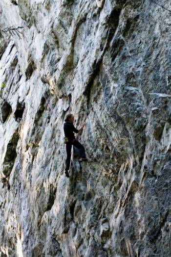 Person Climbing on Rock Mountain Person Climbing on Rock Mountain