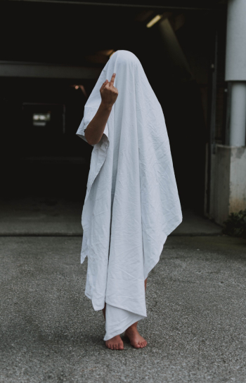 Person Covered by White Cloth Person Covered by White Cloth