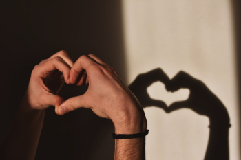 Person Doing Heart Hand Gesture Person Doing Heart Hand Gesture