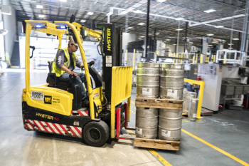 Person Driving Yellow Forklift Person Driving Yellow Forklift