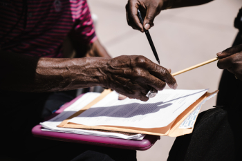 Person Holding A Contract Person Holding A Contract