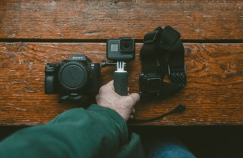 person holding action camera person holding action camera