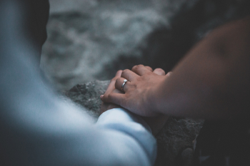 Person Holding Another Person's Hand Person Holding Another Person's Hand