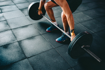 Person Holding Barbell Person Holding Barbell
