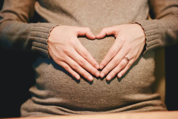 person holding belly photo person holding belly photo