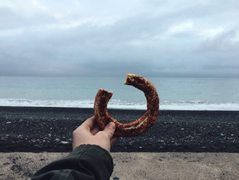 Person Holding Donut Person Holding Donut
