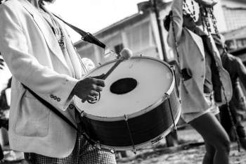 Person Holding Drum Person Holding Drum