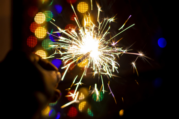 Person Holding Firework Person Holding Firework