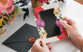 Person holding flower invitation card, | Free Photo - rawpixel