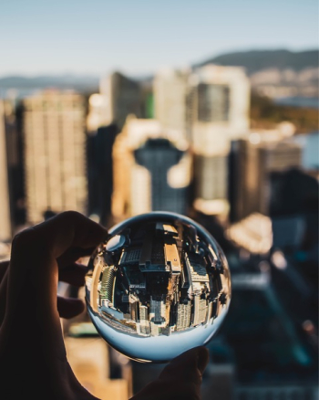 Person Holding Glass Ball Person Holding Glass Ball