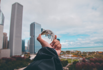Person Holding Glass Ball Person Holding Glass Ball