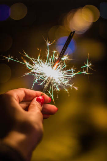 Person Holding Gray Firework Person Holding Gray Firework