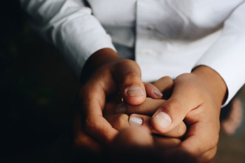 person holding hands person holding hands