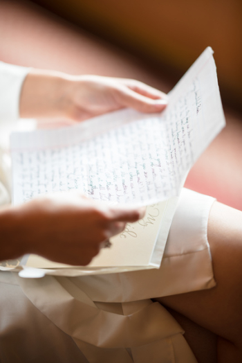 Person Holding Handwritten Letter Person Holding Handwritten Letter