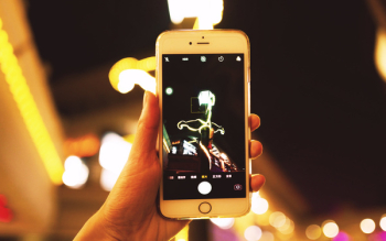 Person Holding Iphone Person Holding Iphone