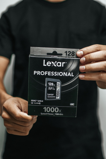 Person Holding Lexar Professional Memory Card Box Person Holding Lexar Professional Memory Card Box