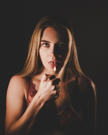 Person Holding Lighter Person Holding Lighter