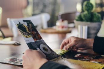 Person Holding Magazine Person Holding Magazine