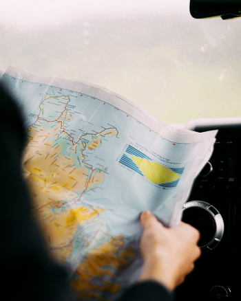 Person Holding Map Person Holding Map
