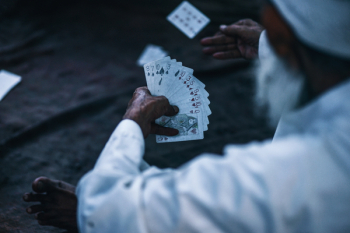 Person Holding Playing Cards Person Holding Playing Cards