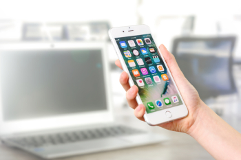 Person Holding Silver Iphone 7 Person Holding Silver Iphone 7