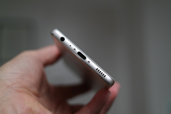 Person Holding Silver Iphone 7 Person Holding Silver Iphone 7