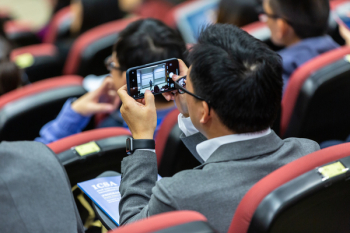 Person Holding Smartphone Person Holding Smartphone
