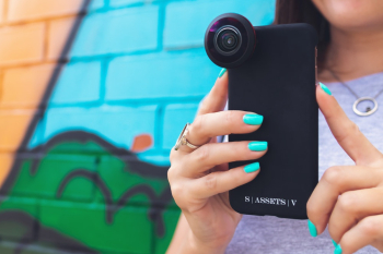 Person Holding Smartphone Person Holding Smartphone