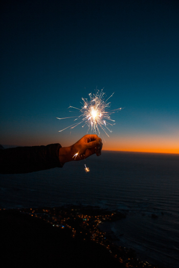 Person Holding Sparkler Person Holding Sparkler