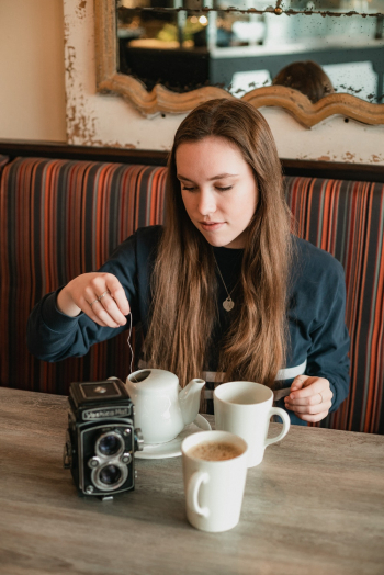 Person Holding Teabag Person Holding Teabag